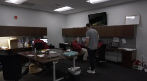 Troy University football team gets behind the scenes help from graduate assistants.