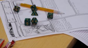 Troy University students start return to normal through role-playing game.