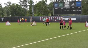 Trojan Soccer team holds camp for youth.