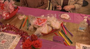 Students decorate personalized Valentine’s Day cookies