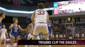 Trojans clip the Eagles in home opener