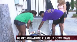 Divine Nine groups band together to clean downtown Troy