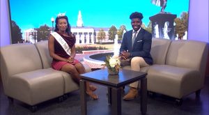 Miss Troy University Anna Grace Tucker prepares to pass on the crown