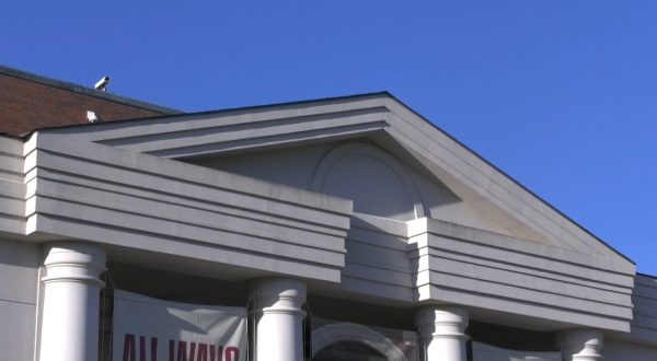 Group climbs onto the roof of Claudia Crosby Theater; raises safety concerns