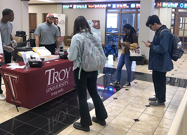 Sorrell College students enjoy a coffee and donut break between classes. (TROY photo)