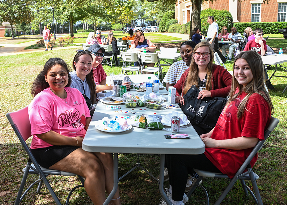 Students having a picnic on the Dothan Campus quad.