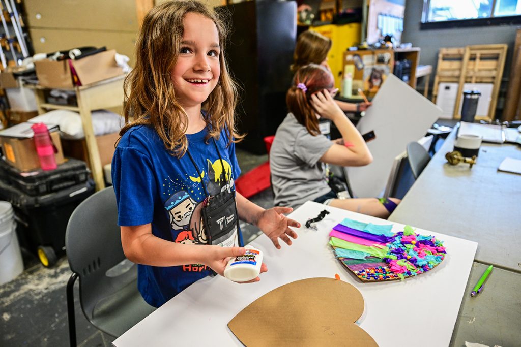 The tech crew works on creating props during the Creative Drama camp.
