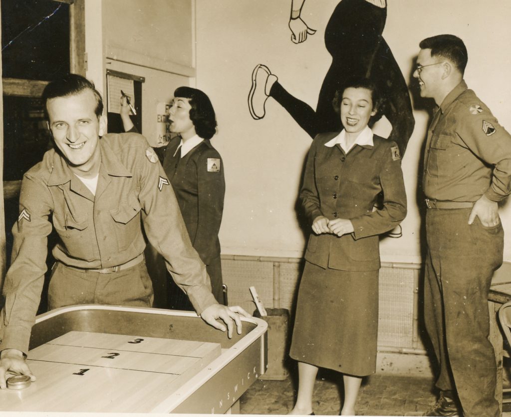 Carolyn Domingus, third from left, in the service club at Pusan, Korea in 1953. (Wiregrass Archives)