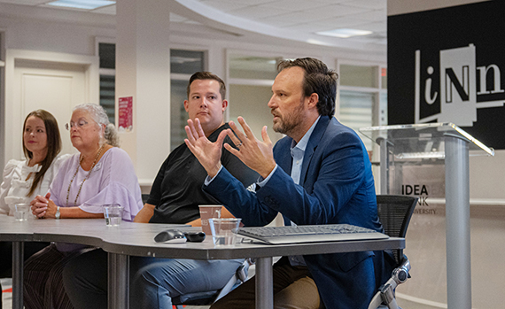 Senior Director of Communications Matt Clower responds to questions from student journalists. (TROY photo/Brady Fitch)