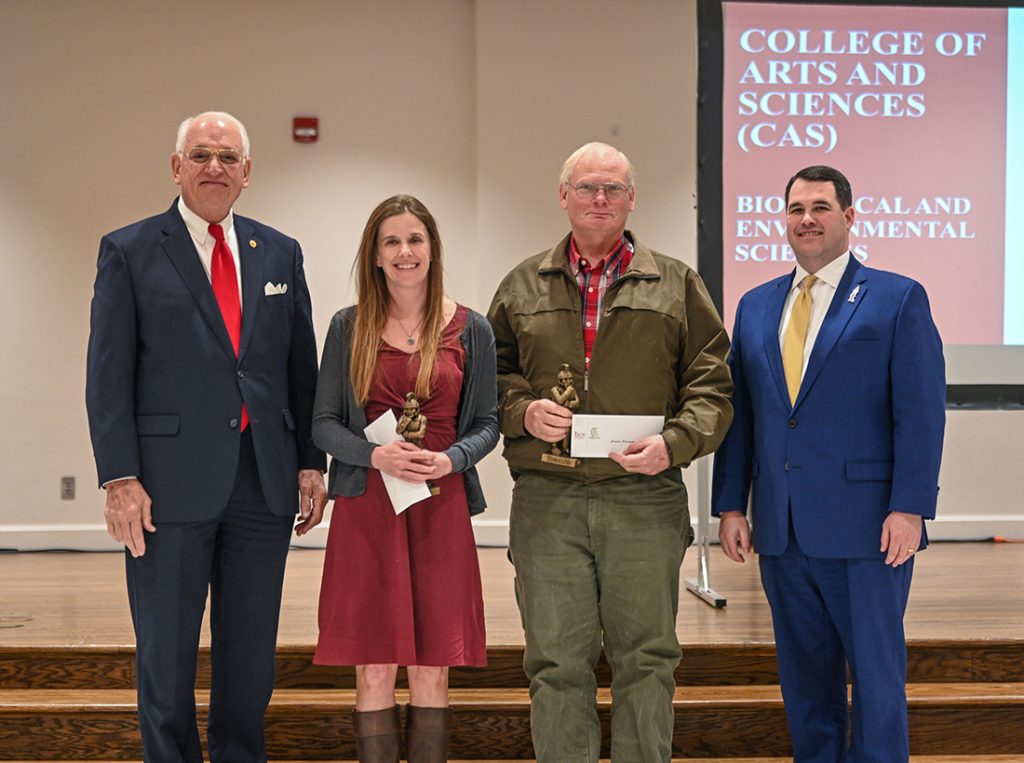 Chancellor Hawkins and William Filmore with Dr. Alvin Diamond and Dr. Samantha Earnest