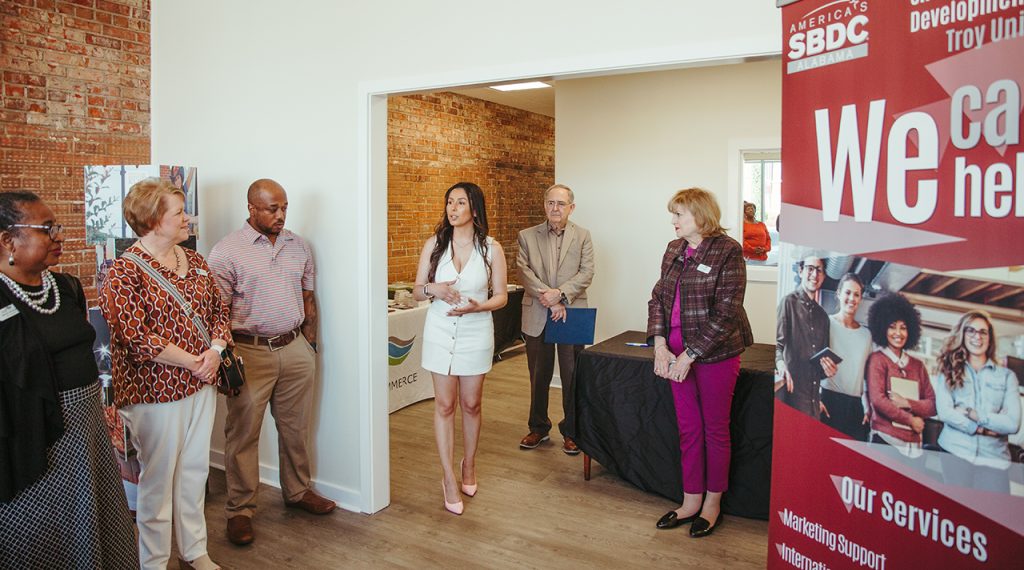SBDC TROY Director Juliana Bolivar, left, Elba Mayor Tom Maddox and Elba Chamber of Commerce President Sandy Bynum Williams welcomed attendees at a ceremony on March 19.
