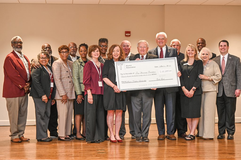 The Alumni Association presented a check for $55,277.