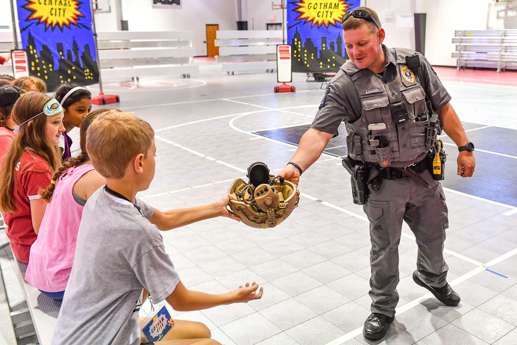 Campers get to meet local community heroes, like police officers, firefighters and healthcare workers.