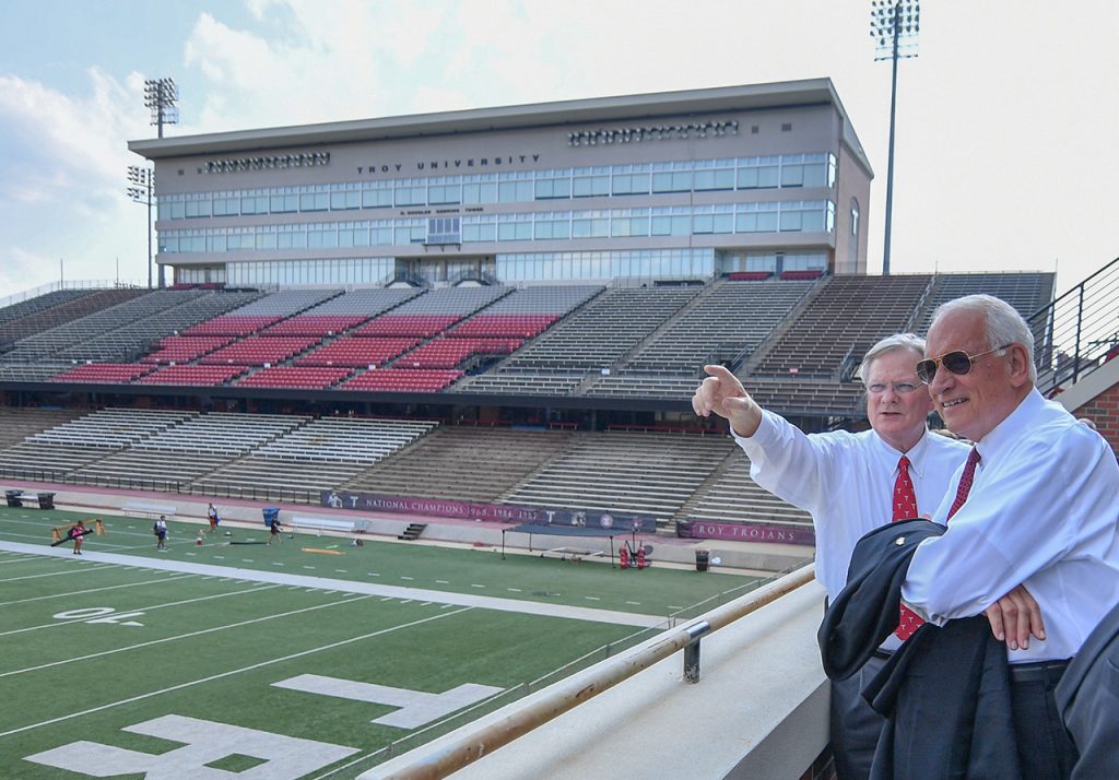 Earl Johnson and Chancellor Jack Hawkins tour Veterans Memorial Stadium at Troy University.