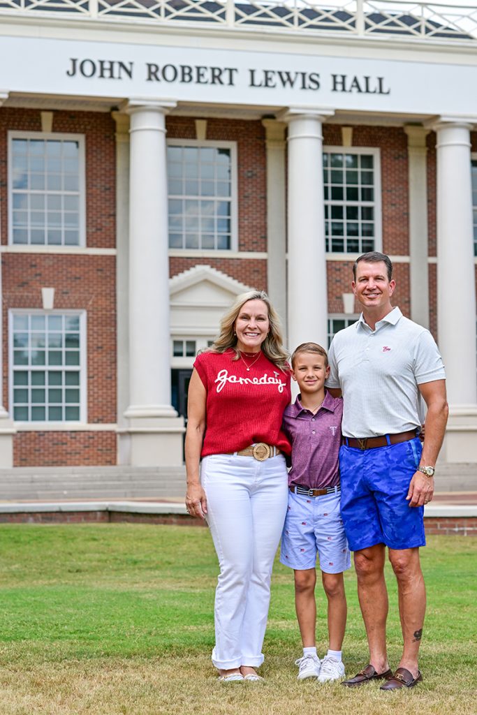 A photo of Chad Fife's family in front of Lewis Hall