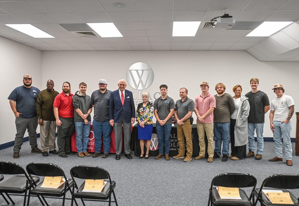 Troy University Chancellor Dr. Jack Hawkins, Jr. and Wallace Community College President Dr. Kathy Murphy with current WCCD engineering students.