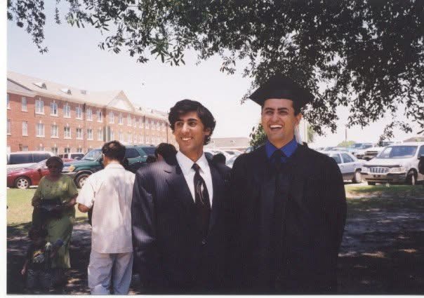 Hassan, right, and his brother on Hassan's bachelor's graduation day.