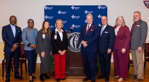 From Left to Right: Isaiah Sankey, Montgomery County Commission; Dr. Dionne Mims, Vice Chancellor of Troy University Montgomery Campus, Julie Firman, Chief Executive Nurse Baptist Health, Judi Miller Cheif Learning Officer Baptist Health, Doug Singleton, Montgomery County Commission, Kerry Palmer, Troy University Senior Vice Chancellor of Academic Affairs, Amanda Dunegan ASN Coordinator; LaGary Carter, Dean of the College of Health Sciences at Troy University