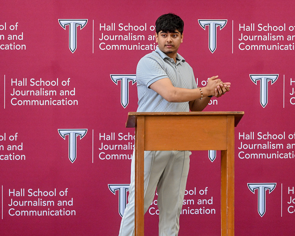 Abhishek Subedi, first runner up,, gives his speech in the library