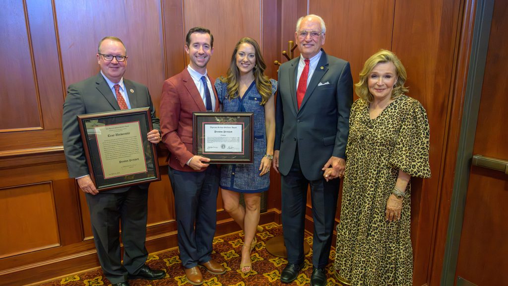 Dr. Kerry Palmer, Dr. Jack Hawkins, Jr. and Mrs. Janice Hawkins with Sullivan Award winner Preston Pritchett and his wife, KeLeigh.