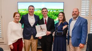 Amburn receives scholarship from The Waters alumnic chapter, prepares to continue family’s history with TROY