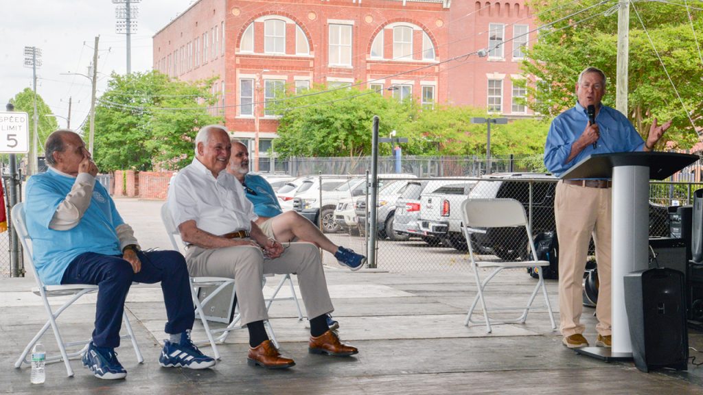 Former Montgomery Mayor Todd Strange speaks about Troy University Chancellor Dr. Jack Hawkins, Jr. during the Montgomery Sunrise Rotary Club's annual presentation of the Commitment to Service Award.