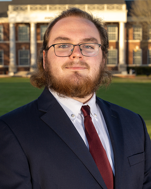 a headshot of Kaelan Burger