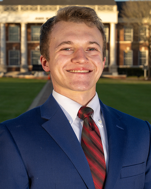 a headshot of Noah Hadwin