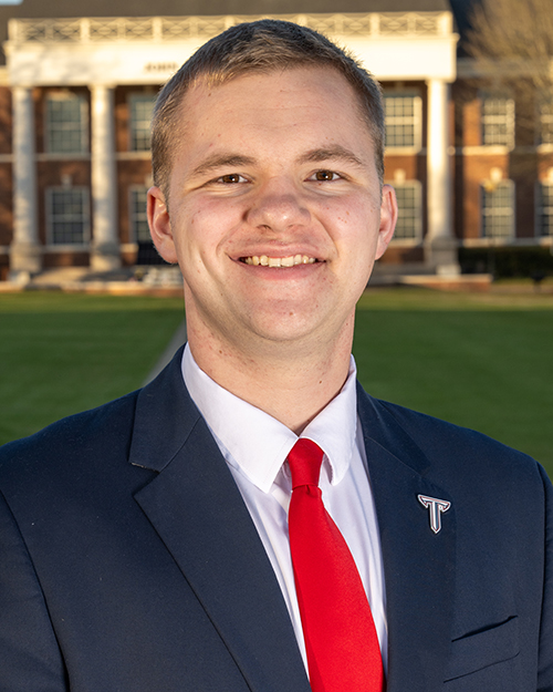 a headshot of caleb smith