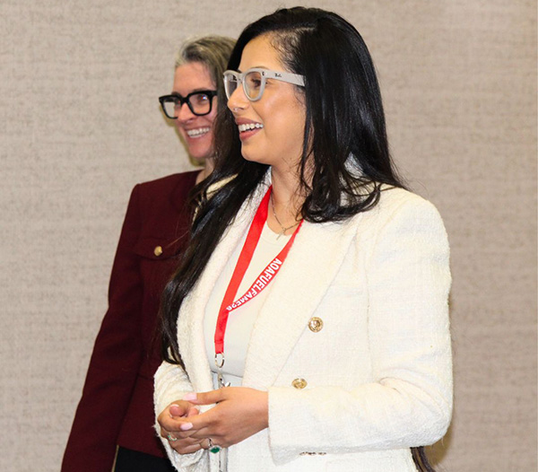 A photo of Juliana Bolivar speaking at a conference
