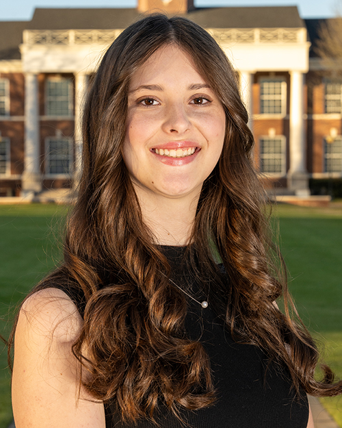 a headshot of zoe johnson