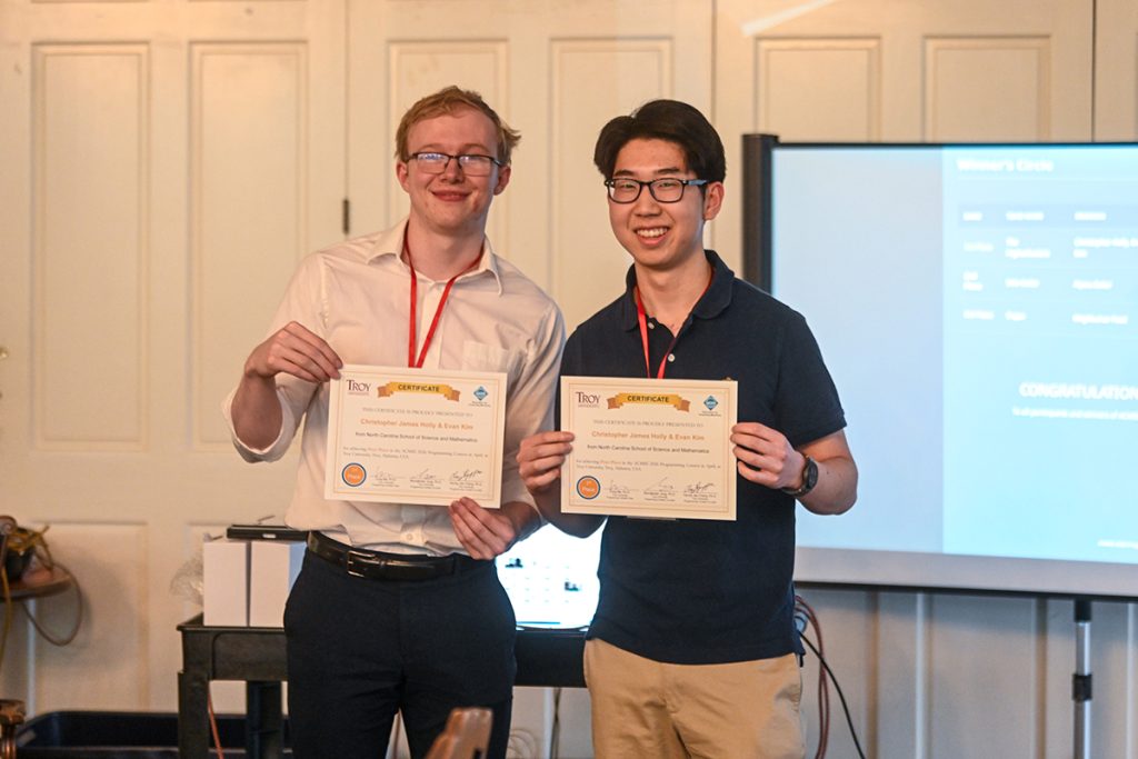 Christopher James Holly and Evan Kim were a set of programming contest winners