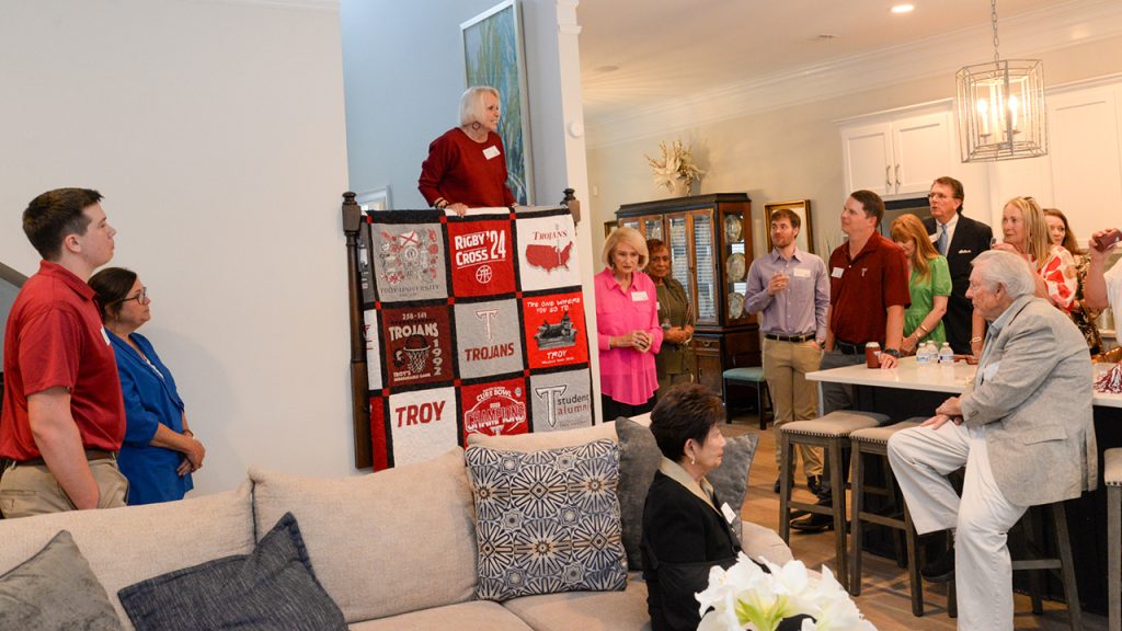 Alumni Director Faith Byrd addresses members of the Montgomery Metro Alumni Chapter during an event at her home.