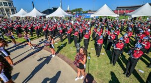 Troy University's Sound of the South Marching Band performs during Trojan Walk. 