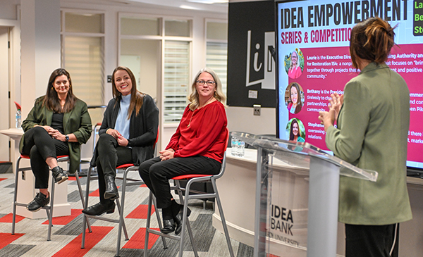 A photo of panel of speakers