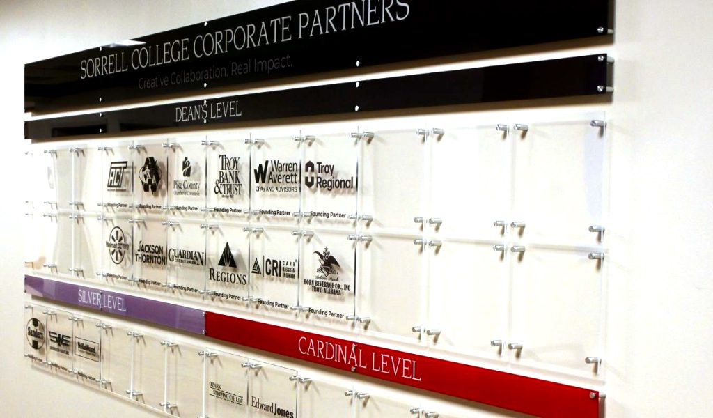 a picture of a wall of corporate logos