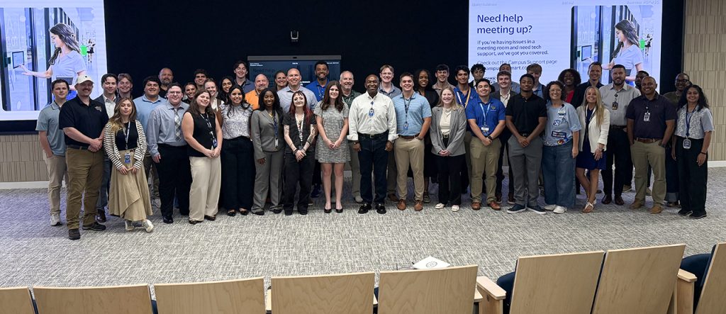 a large group photo of summer interns