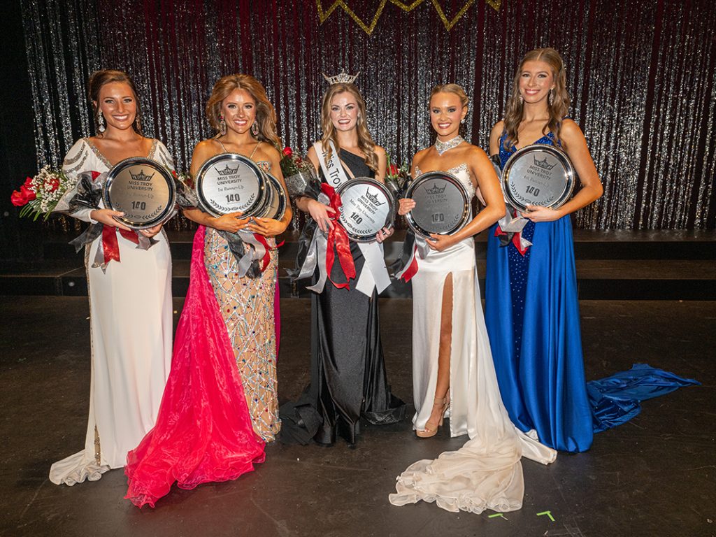 From left, Taylor Grace Daniel, Isabella Calasso, Gracen Murphy, Madison Belk and Isabella Colagross stand with their awards and flowers.