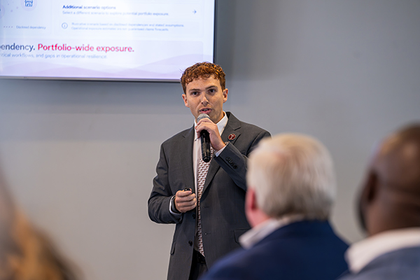 a student speaking to a group