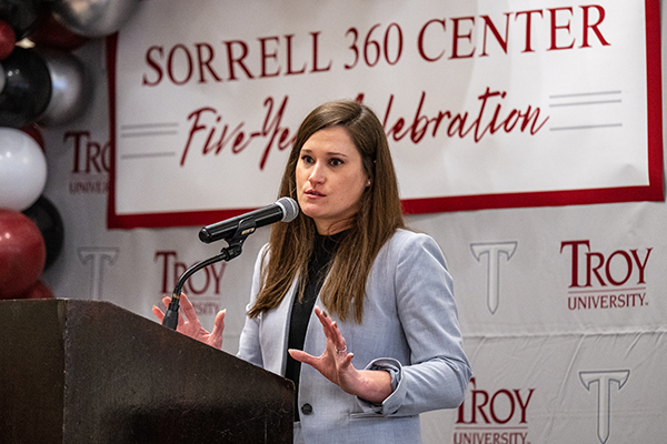 a photo of someone speaking at the podium